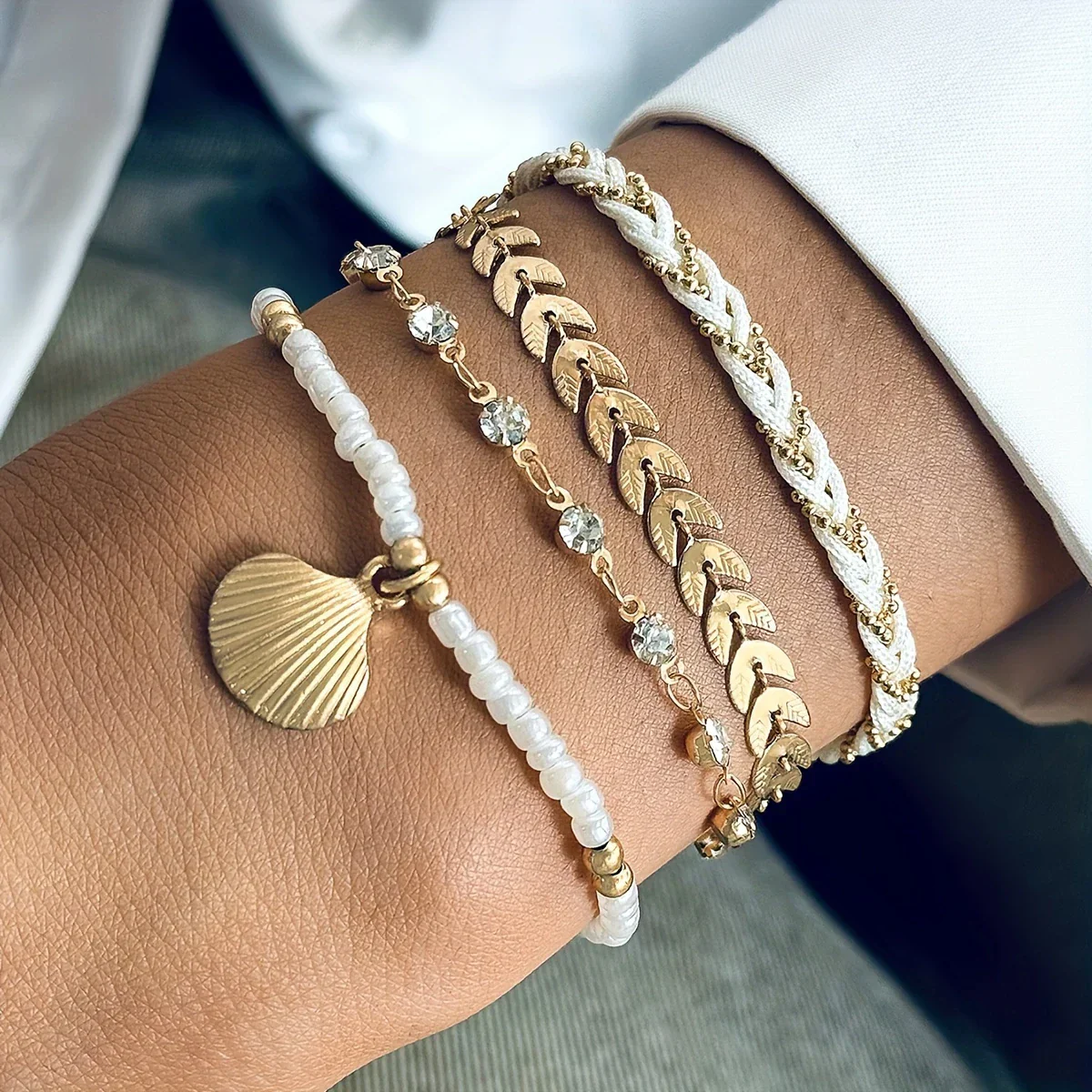 Set of 4 Elegant Gold Shell Bracelets - Image 2